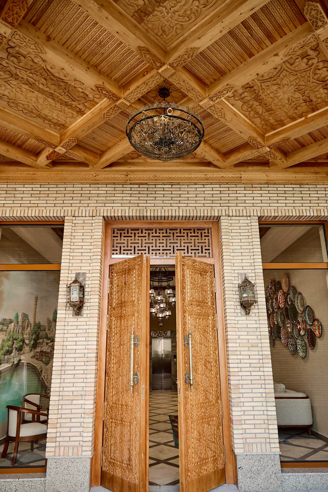 Traditional carved entrance of Qadim Yard