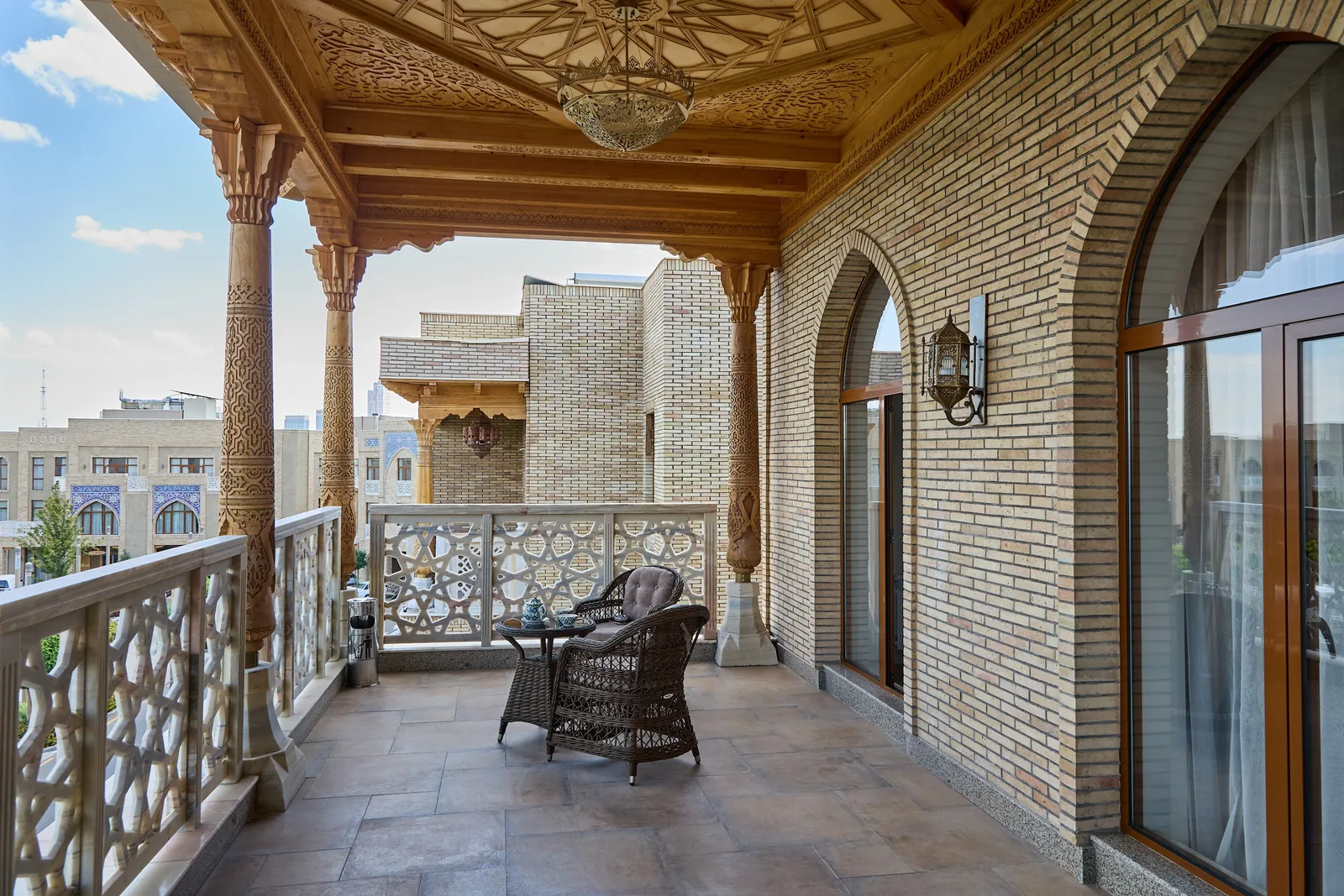 Wood-carved terrace at Qadim Yard